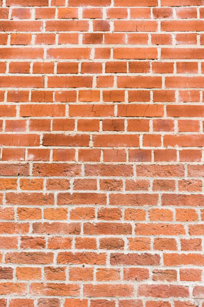 istock brick red wall texture. background of a old brick house. 1257453390