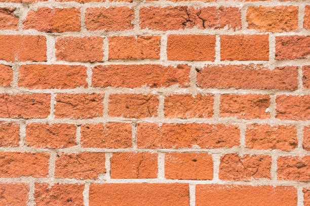 istock brick red wall texture. background of a old brick house. 1257453547