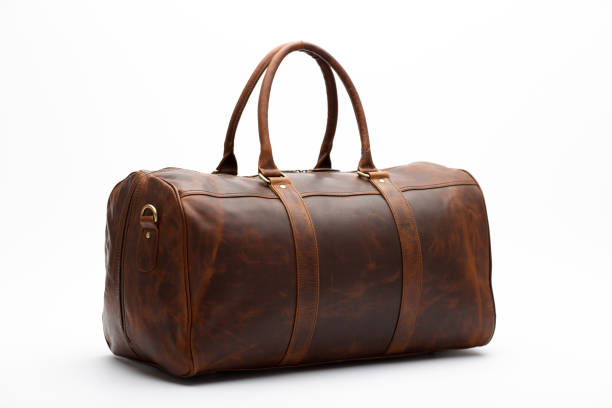 duffel bag travel case leather holdall valise fashion modern duffel bag travel case leather holdall valise fashion modern carry handle luggage strap stock pictures, royalty-free photos & images
