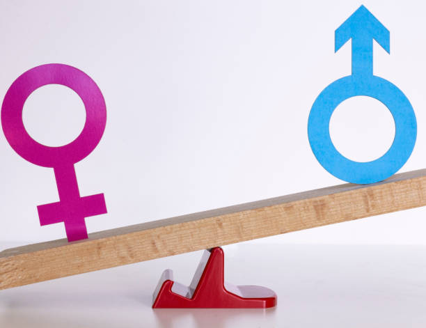 Gender Inequality Male and Female symbols on a lever. Imbalance. affirmative action photos stock pictures, royalty-free photos & images