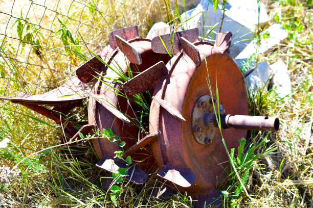 istock Iron agricultural machinery for mowing grass and plowing 1257467812