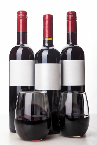 Bottles of wine on the shelves of an alcohol shop in Spain, Alicante. Background, horizontal orientation