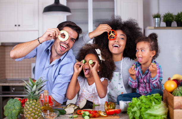 istock Happy family in the kitchen. 1257477313