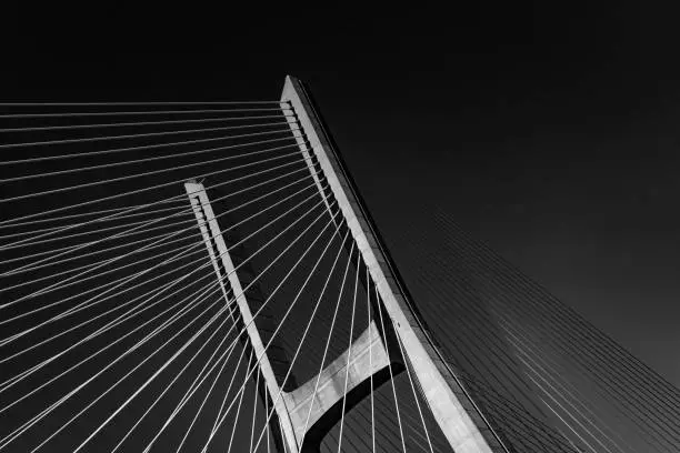 Vasco da Gama Bridge landscape view detail in black and white background wallpaper image photography by tagus river, Lisbon, Portugal