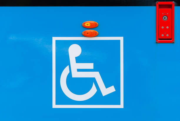 istock sign for disabled at city tram side, public transport accessibility 1257481712