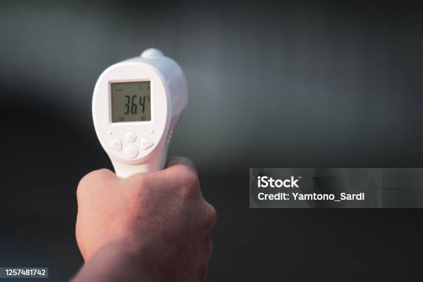 Thermo Gun A Tool To Measure Body Temperature Stock Photo - Download Image  Now - Thermal Image, Office, Hand - iStock