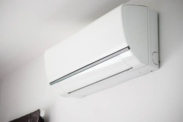 istock Air conditioner on white wall room interior background 1257482166