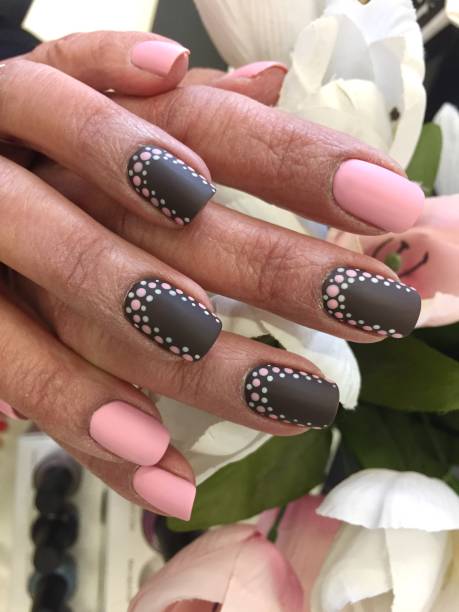 istock Polka Dot Nail Art Design 1257490482