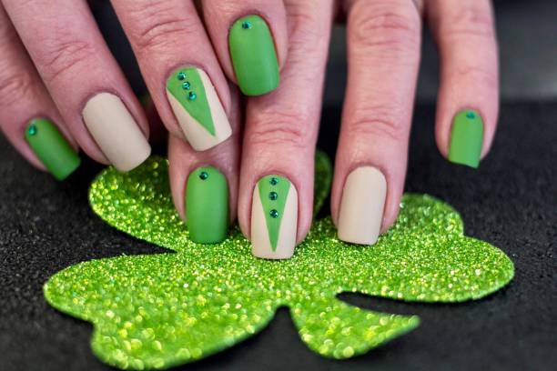 istock Green and Tan Nail Art Design 1257490518