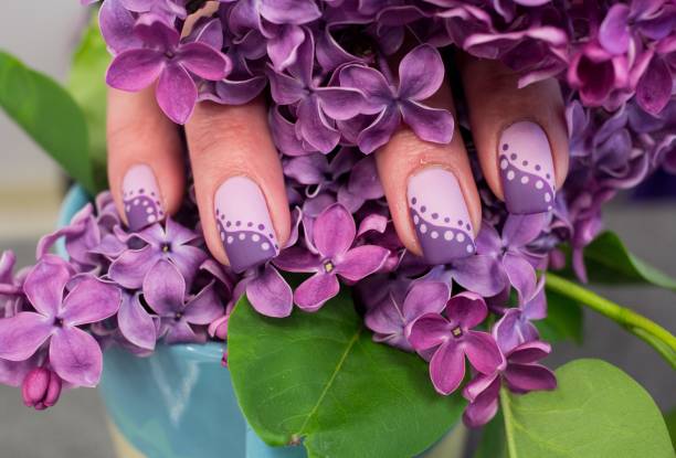 istock Purple Polka Dot Nail Art Design 1257490555