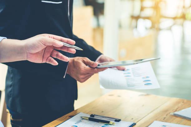 istock Business Corporate team brainstorming with chart and checking and analysis 1257490562