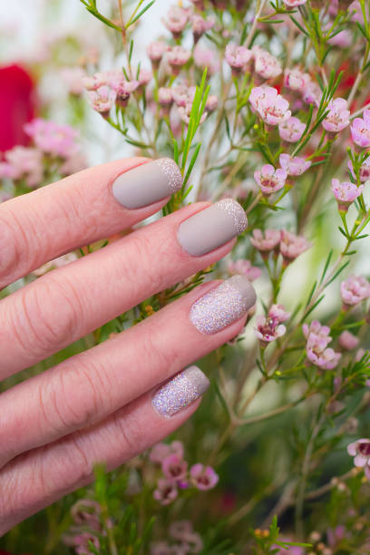 istock Pink Glitter Nail Art Design 1257490618