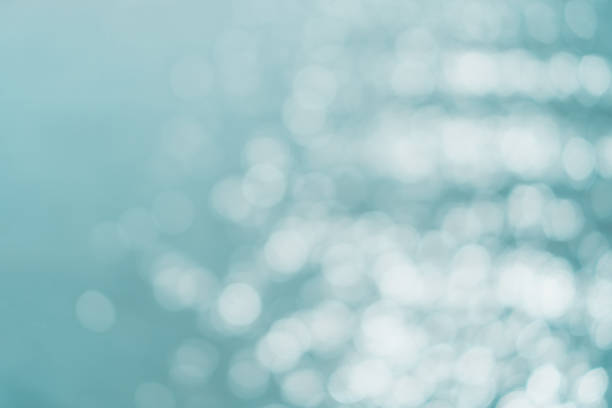 istock Blur beach with bokeh orange sunset theme color background. 1257496916