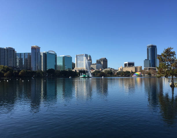 istock Orlando Florida city skyline from Lake Eola 1257498860