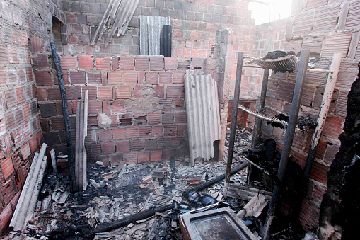 Ruins of a house set on fire in the Baianao neighborhood in the city of Porto Seguro, in southern Bahia.