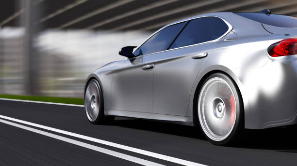 istock car driving on a road 1257503888
