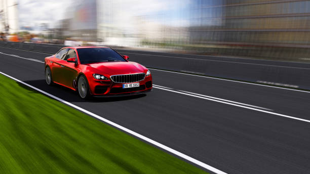 istock car driving on a road 1257503894