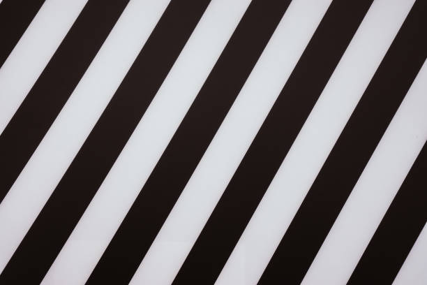 Black and white diagonal stripes background stock photo