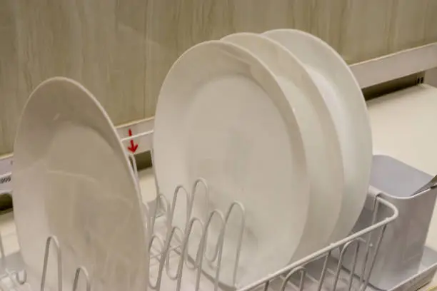 Photo of White plate on dish rack