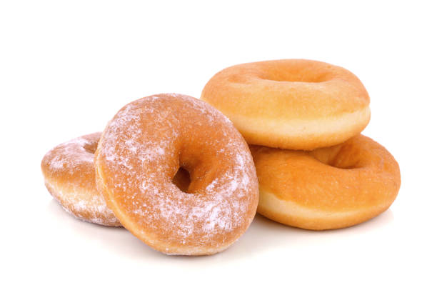 istock Delicious donuts isolated on a white 1257511767