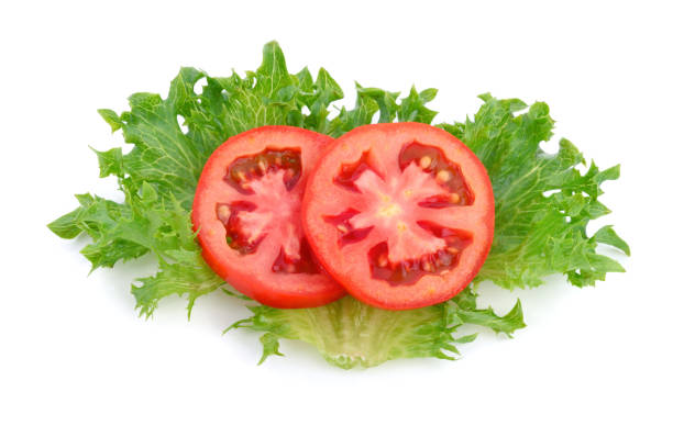 istock Tomato sliced on frillice iceberg on white background 1257515675