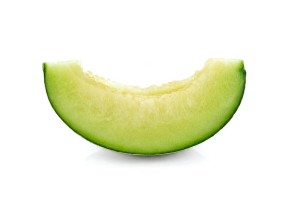 Sliced green cantaloupe melon isolated on white