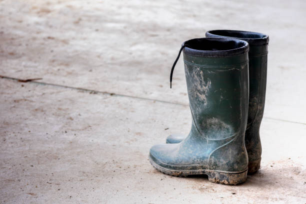 istock Boots are placed on the concrete floor 5648 1257517516