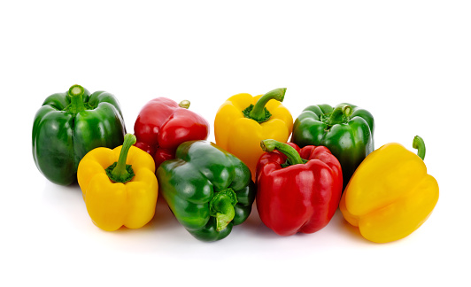 Fresh sweet peppers isolated on white background