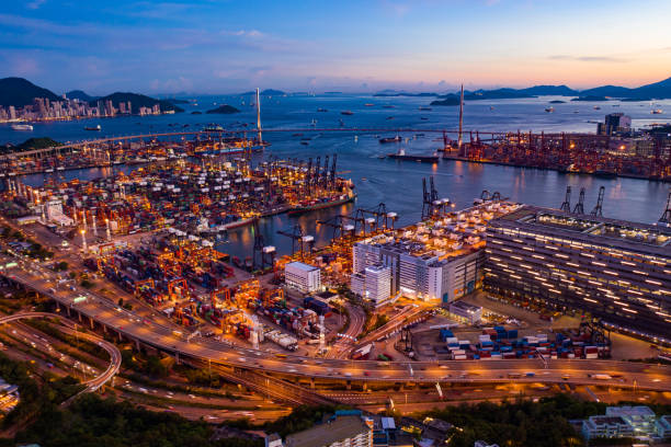 istock Drone view of Container ship in the harbor at night 1257519062