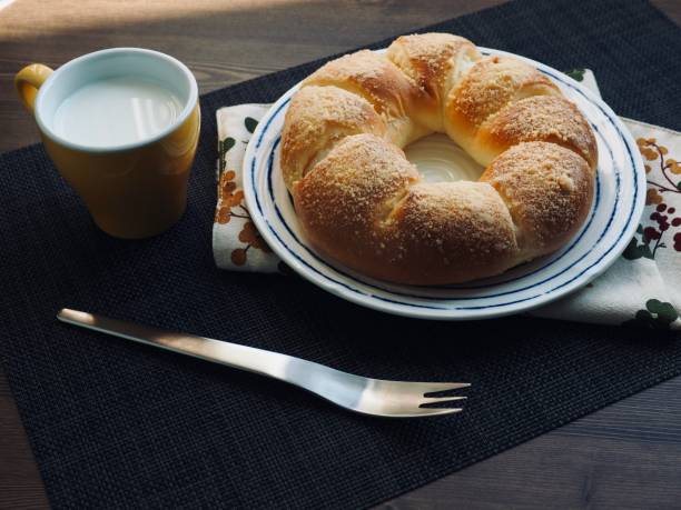 istock Fresh round Chocolate Cream bread and milk 1257523886