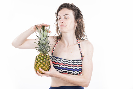 fresh pineapple and healthy woman
