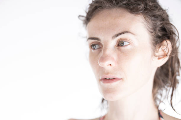 portrait of a young woman in front of white background
