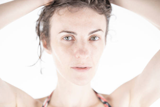 portrait of a young woman in front of white background