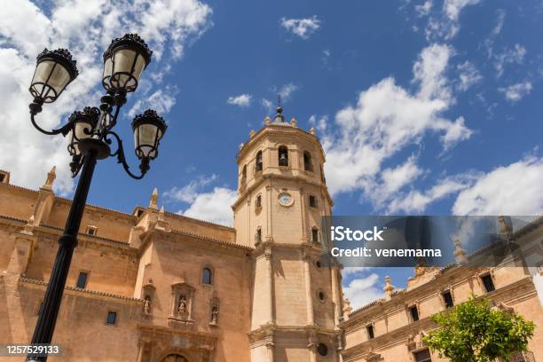 Street Light And Tower Of The San Patricio Church In Lorca Stock Photo - Download Image Now