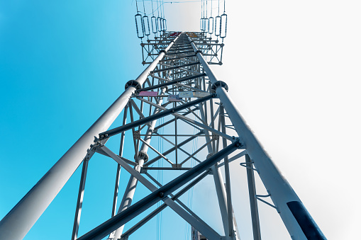 low angle view of  electricity transmission tower with copy space.