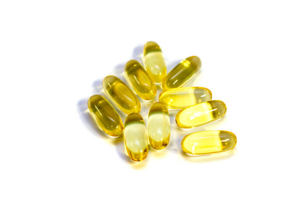 istock yellow medicine pills on the white background 1257532257
