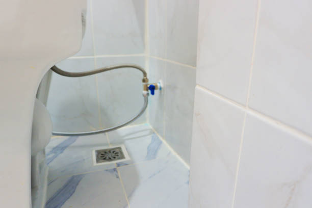 interior design Installation of sanitary ware and valves in bathroom flushing valve public restroom toilet stock pictures, royalty-free photos & images