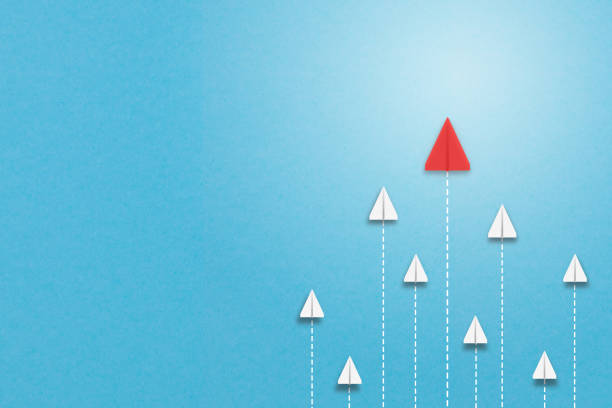 istock leader red Paper plane leading of business teamwork creative concept idea. 3d rendering 1257534684
