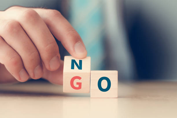 istock business decision concept. man flip wooden block cube form plan no to GO 1257534687