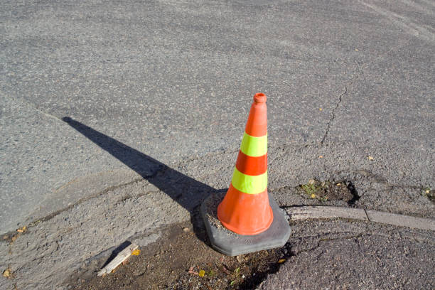 istock traffic cone on street corner 1257540202