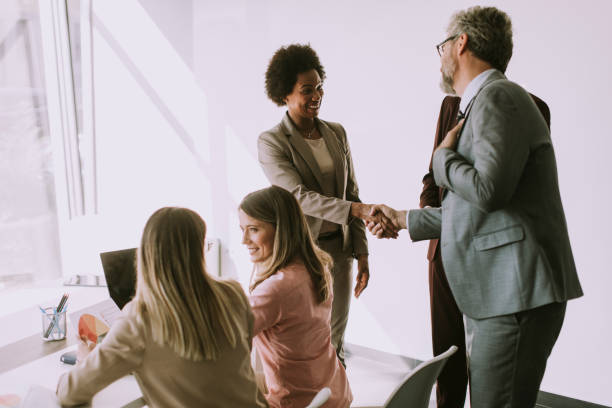 istock Group of young multiethnic business people working on new project 1257541455