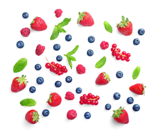 istock Fruit pattern of assorted wild berries isolated on white background. Top view 1257543996