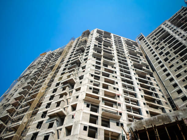 istock Building under construction. New Housing Project. Upcoming Residential Projects Building. Under Constructions Projects in modern city. Tallest building in the world under construction. 1257546982