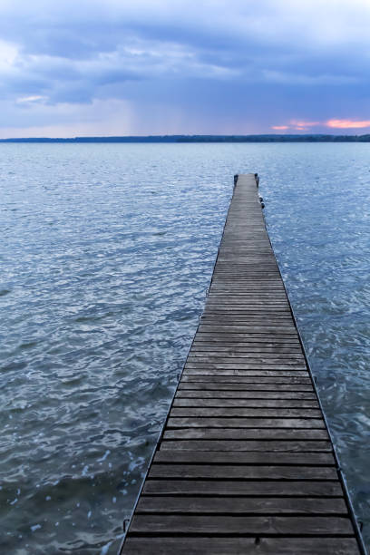 istock Pier at a lake by almost night 1257547890