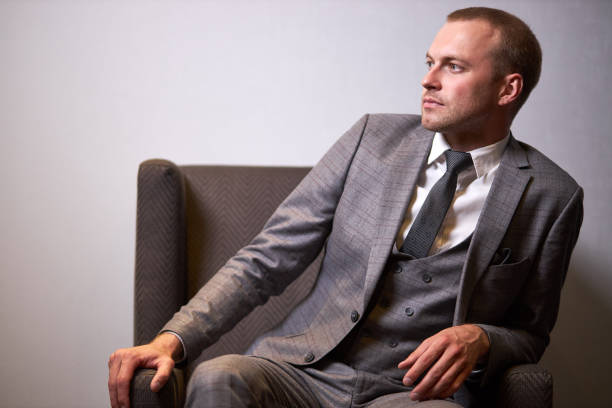istock stylish businessman or boss looking away, posing 1257552131