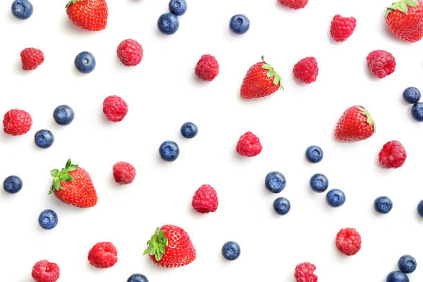 istock Assorted wild fresh berries isolated on white background. Top view. Copy space 1257552979