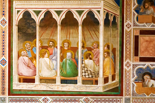 The Pentecost, painted by Giotto di Bondone in Scrovegni Chapel of Padua, Italy. The Scrovegni Chapel is a small church in Padua, region of Veneto, Italy. The chapel contains a fresco cycle by Giotto, completed about 1305 and considered to be an important masterpiece of Western art.