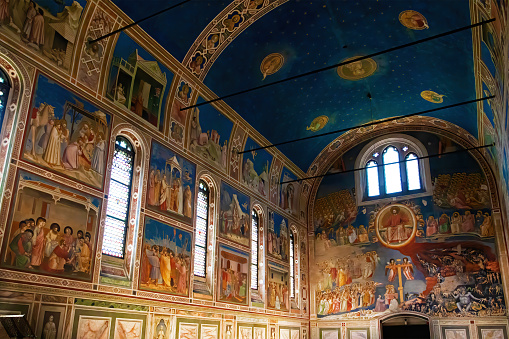 The beauty and the magnificence of Scrovegni Chapel, painted by Giotto di Bondone, in Padua, Italy. The Scrovegni Chapel is a small church in Padua, region of Veneto, Italy. The chapel contains a fresco cycle by Giotto, completed about 1305 and considered to be an important masterpiece of Western art.