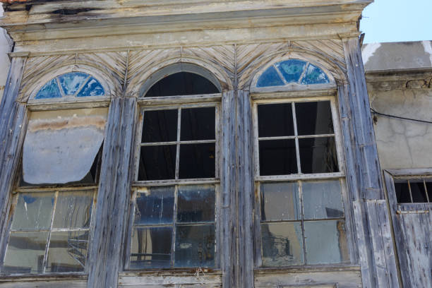 istock old wooden balcony with broken Windows 1257553107