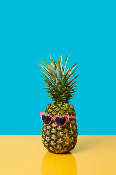 istock pineapple wearing heart-shaped sunglasses 1257553380